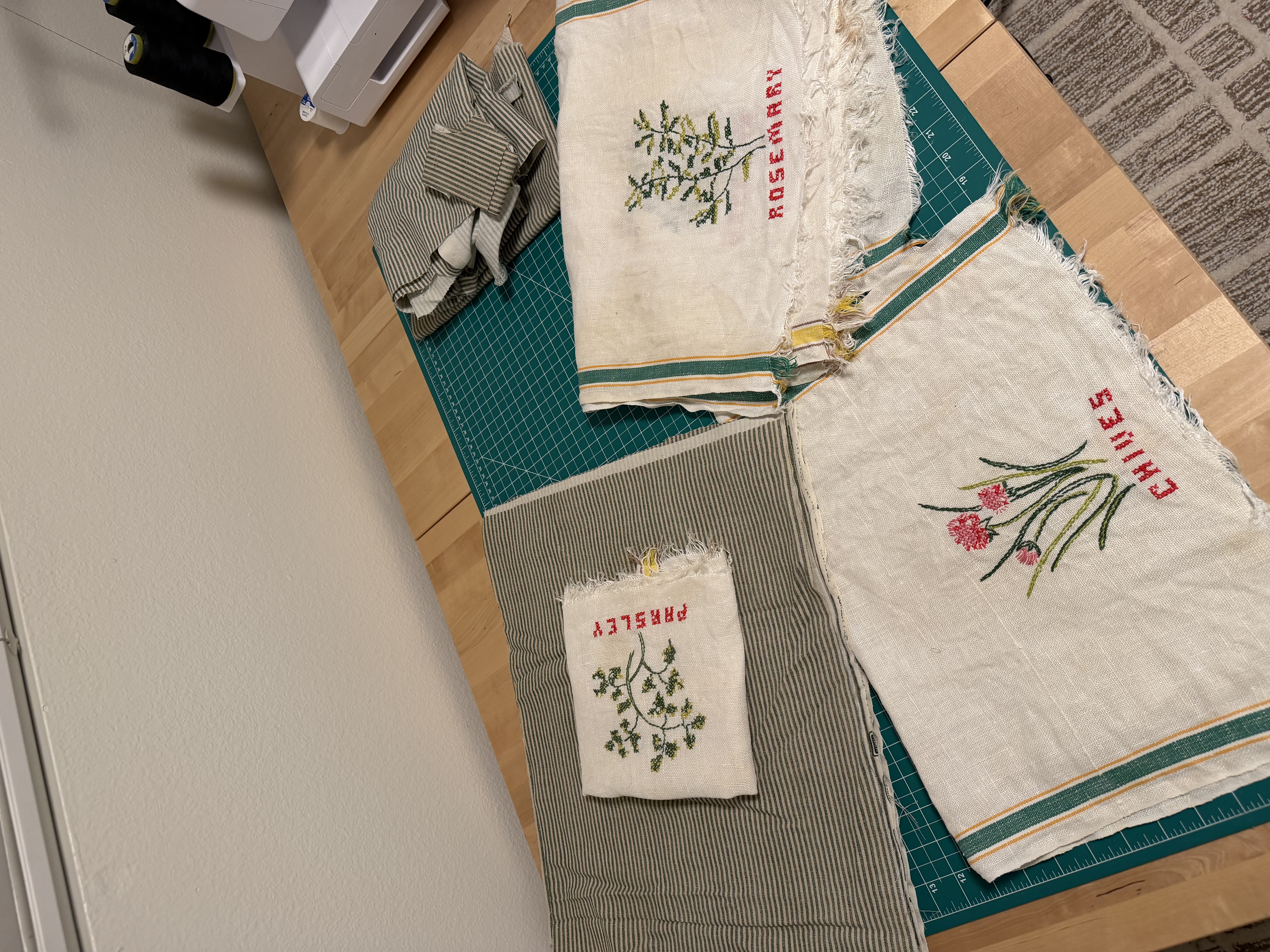 Brainstorming how big to cut each embroidered square and where to place it on the tote